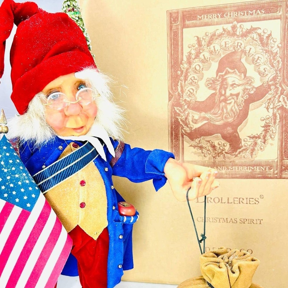 Demdaco Drolleries Christmas Spirit Elf with Flag and Tree Deborah Henderson